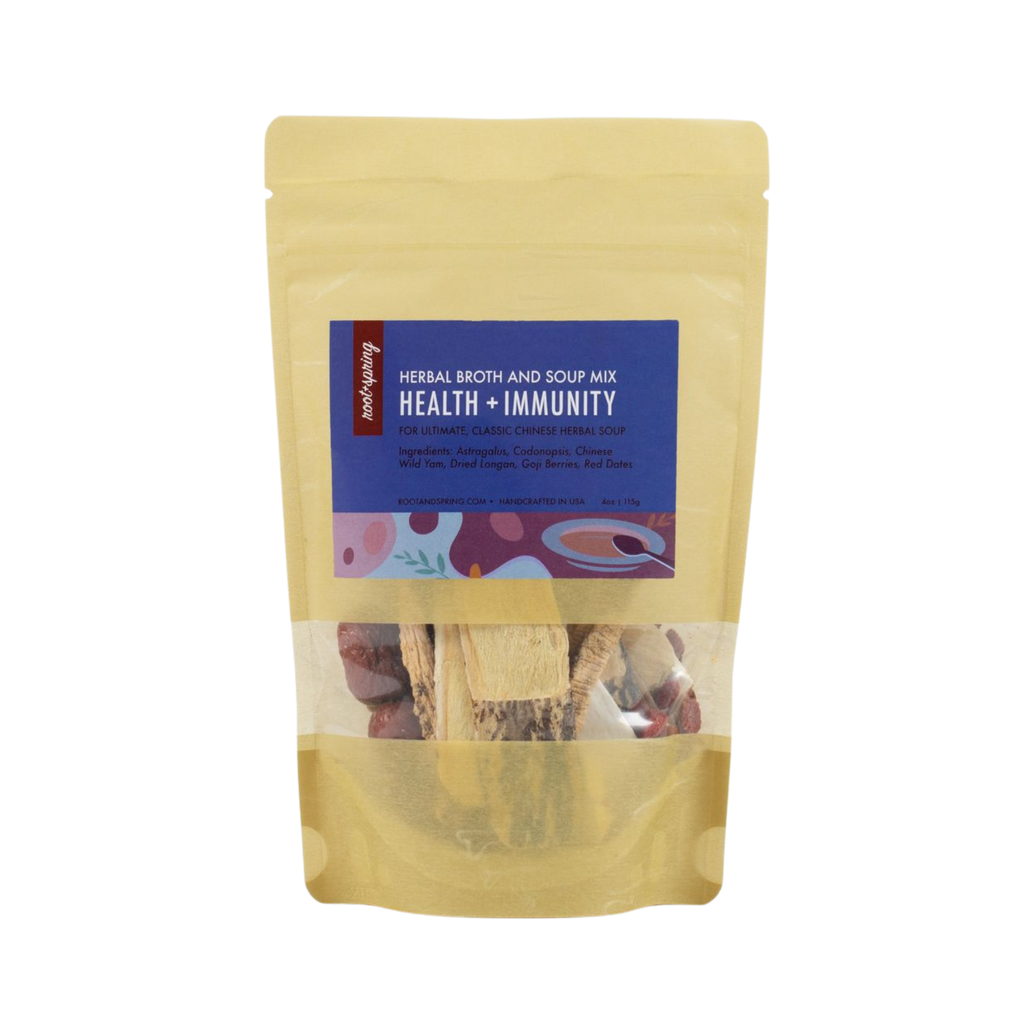 A stand-up pouch of Root+Spring Herbal Broth and Soup Mix Health + Immunity on a plain white background. 