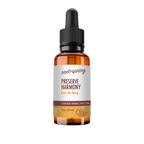 A 1 oz amber glass dropper bottle of Root+Spring Preserve Harmony Chinese Herbal Tincture, featuring a white label with brown and yellow text, and a black dropper cap, isolated on a white background.